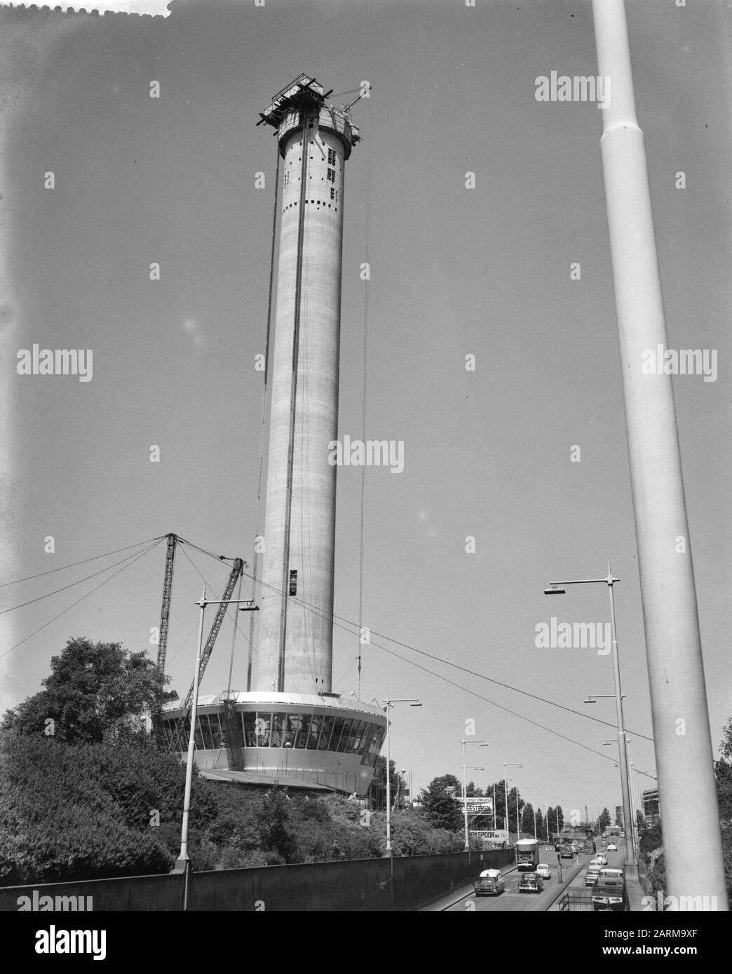 The Euromast  Euromast, restaurant is hoisted to top Annotation: The Euromast (1958-1960) was designed by architect H.A. Maaskant on the occasion of the Floriade in Rotterdam in 1960. designated as National Monument Date: 6 July 1959 Location: Rotterdam, Zuid-Holland Keywords: construction Stock Photo
