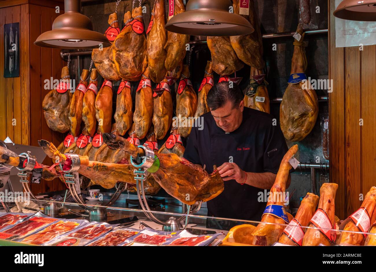 Valencia, Spain - October 11, 2019: Jamon stall at the central market of Valencia. Stock Photo