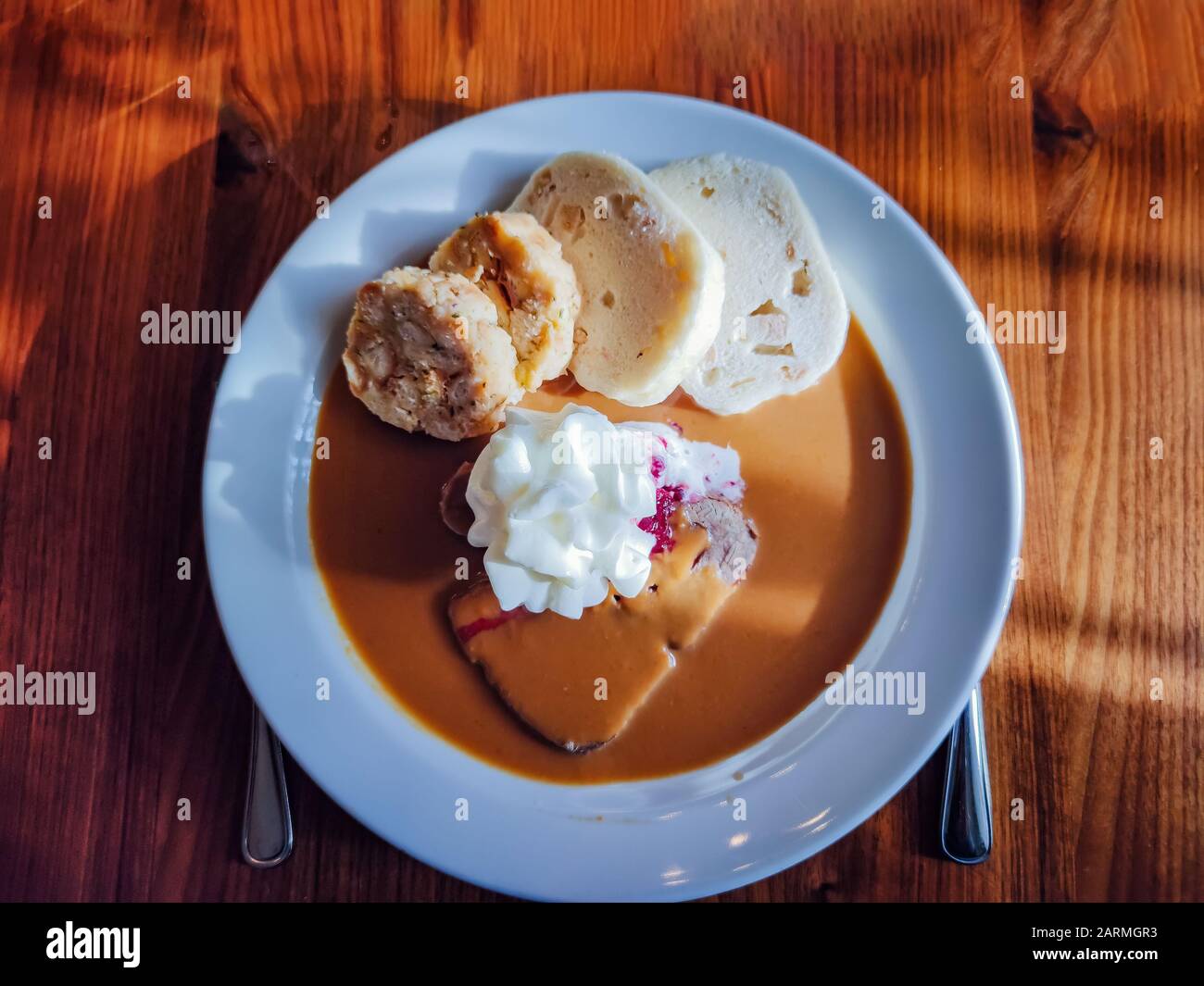 Svickova na smetane ( beef in sour cream sauce) with whipped cream and