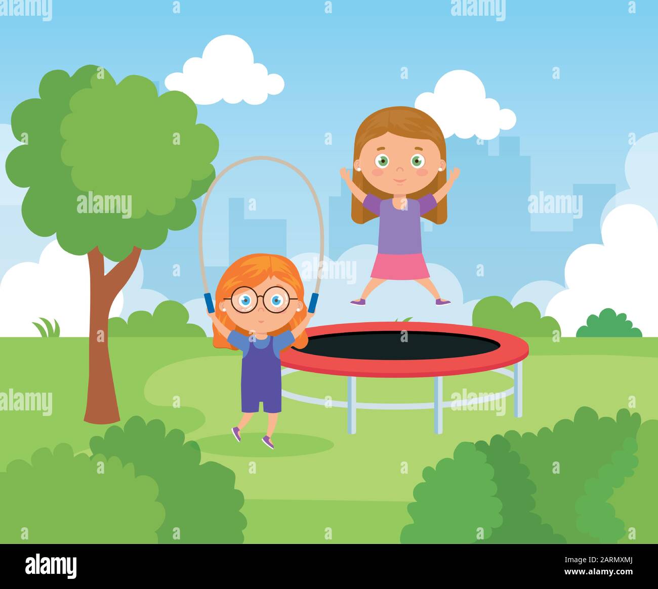 little girls with trampoline jump and rope jump in park landscape Stock