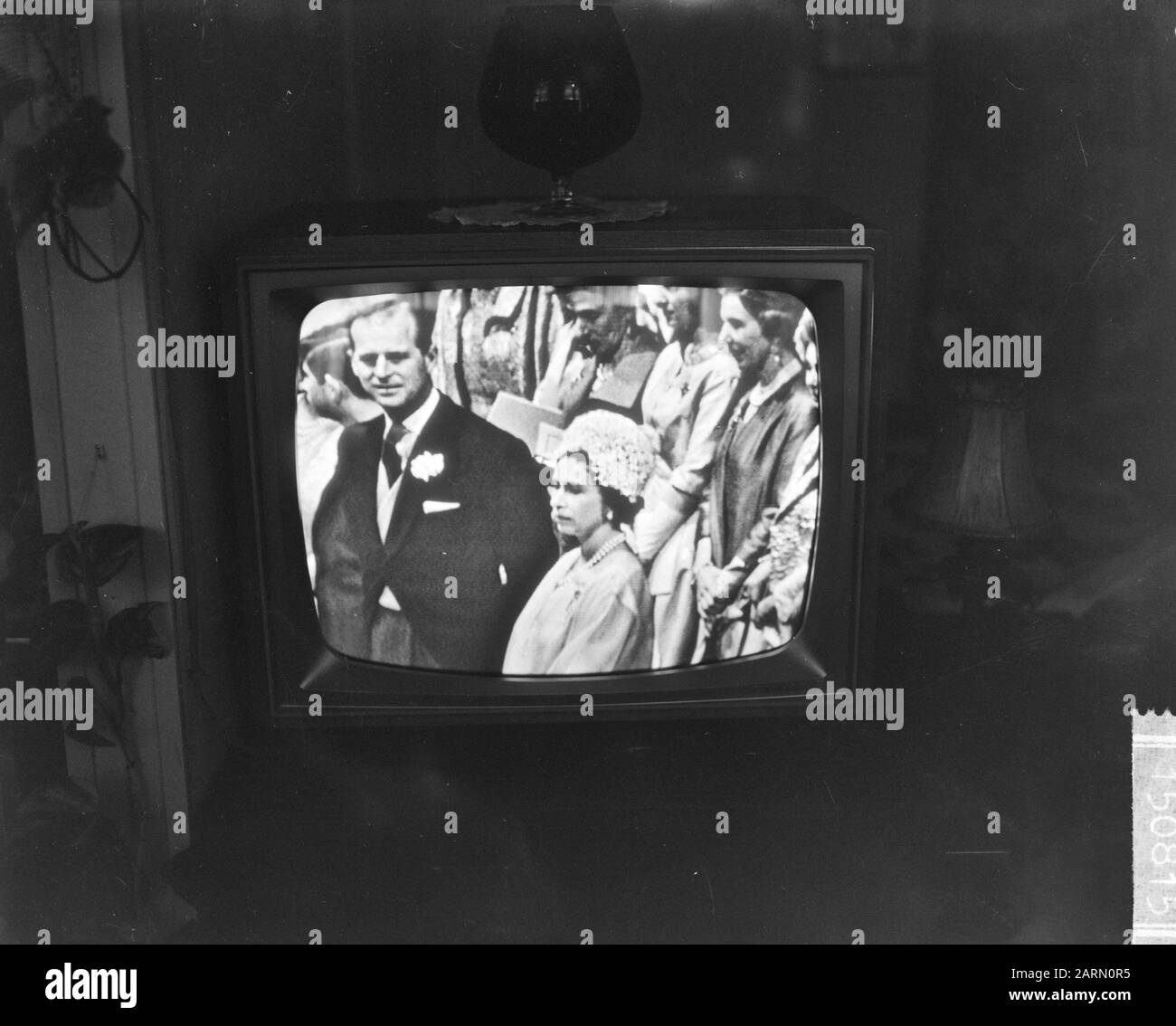 Marriage Alexandra of Kent with Angus Ogilvy in Westminster Abbey in London [photo from TV]. Prince Philip (left) and Queen Elizabeth Date: 24 April 1963 Location: Great Britain, London Keywords: nobility, marriages Personal name: Elizabeth Queen, Philip, Prince of Great Britain Stock Photo