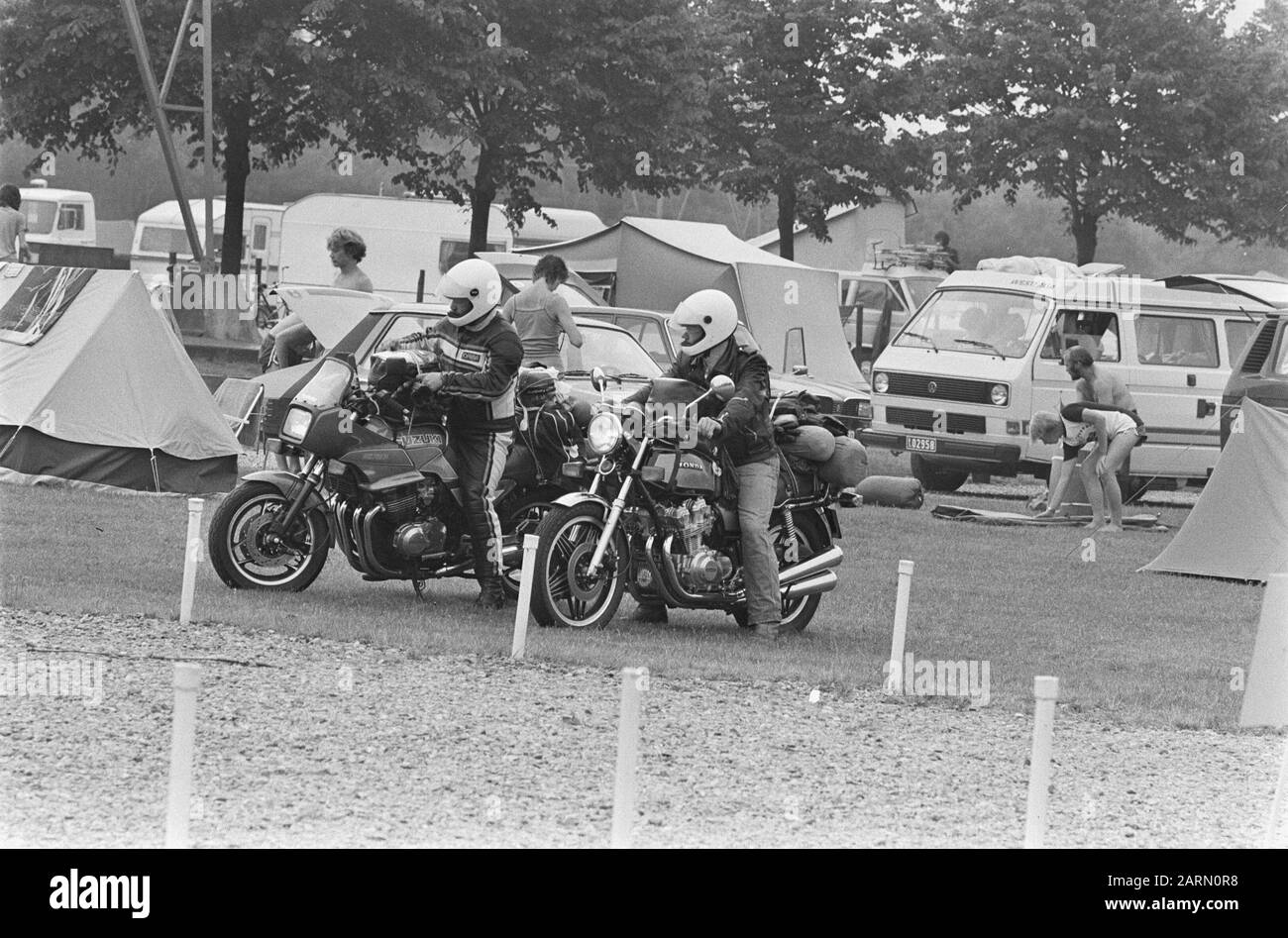 Start of holiday exodus  Holidaymakers on motorcycles arrive at a campsite Date: June 24, 1983 Keywords: campsites, motorcycles, tents, holidays, summer Stock Photo