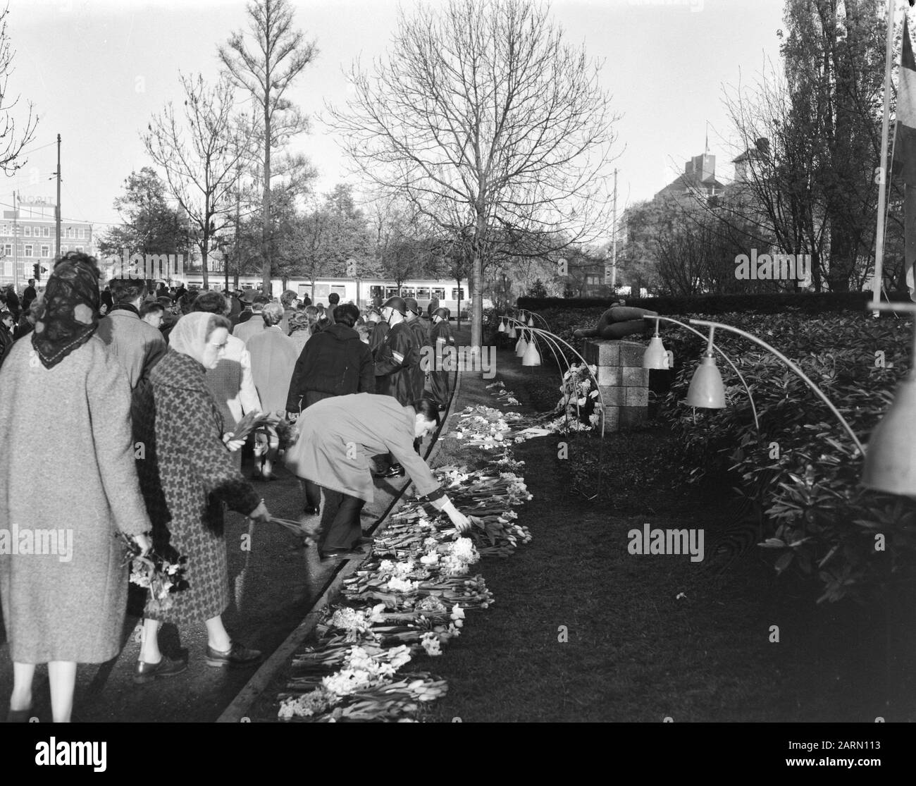 Commemoration of the Dead; flower arrangement at the war monument for gunned resistance fighters on the Weteringschans Annotation: The monument is a design by Jan Havermans Date: 8 May 1963 Location: Amsterdam, Noord-Holland Keywords: commemorations of death, war monuments Stock Photo