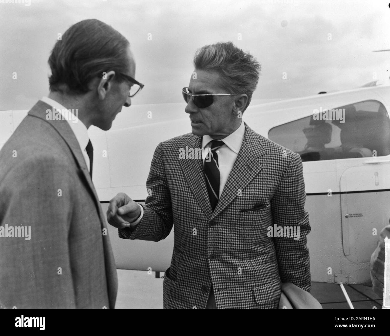 Herbert von Karajan German conductor with private device at Schiphol Date: 24 June 1963 Location: Noord-Holland, Schiphol Keywords: conductors Personal name: Herbert von Karajan Stock Photo
