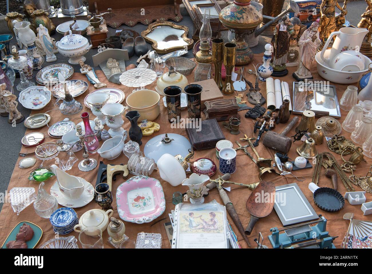 Tongeren, Belgium - August 4, 2019; Antiques on a booth on the streets of Tongeren, a famous large antique market Stock Photo