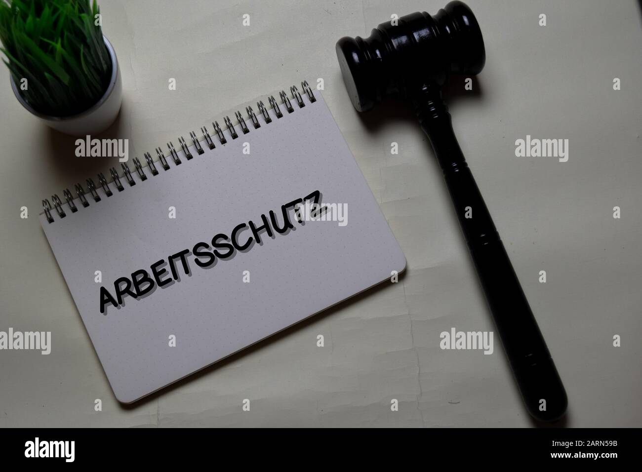 Arbeitsschutz write on a book with gavel isolated on Office Desk