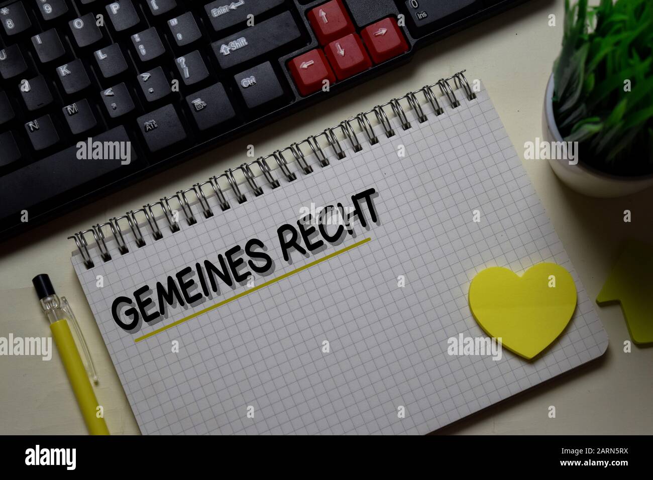 Gemeines Recht write on a book isolated on office desk. German Language