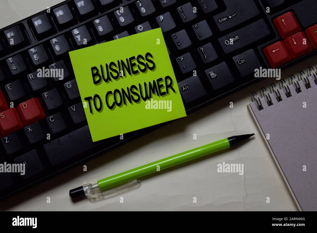 Business To Consumer write on a sticky note isolated on office desk ...