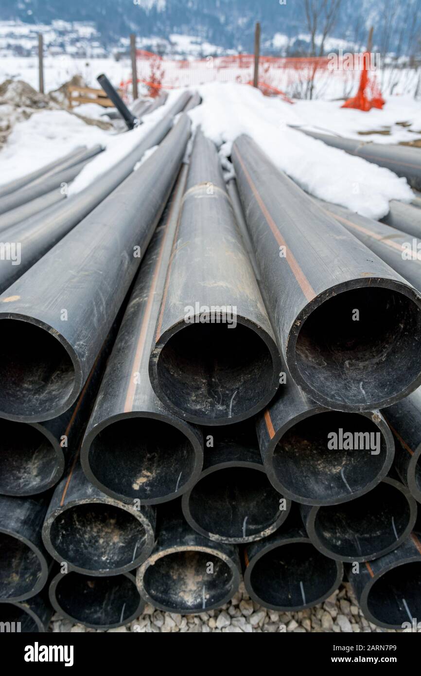 Pile Of Plastic Pipes On Construction Site Ready To Be Used Stock Photo 