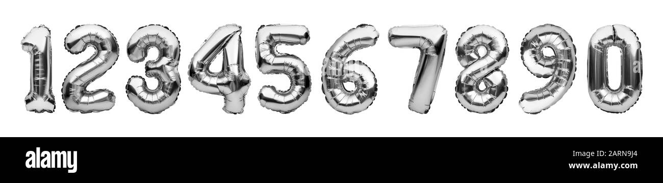 Set with silver foil balloons in shape of numbers isolated on white background. Numbers white gold metallic inflatable balloons. Celebration Stock Photo