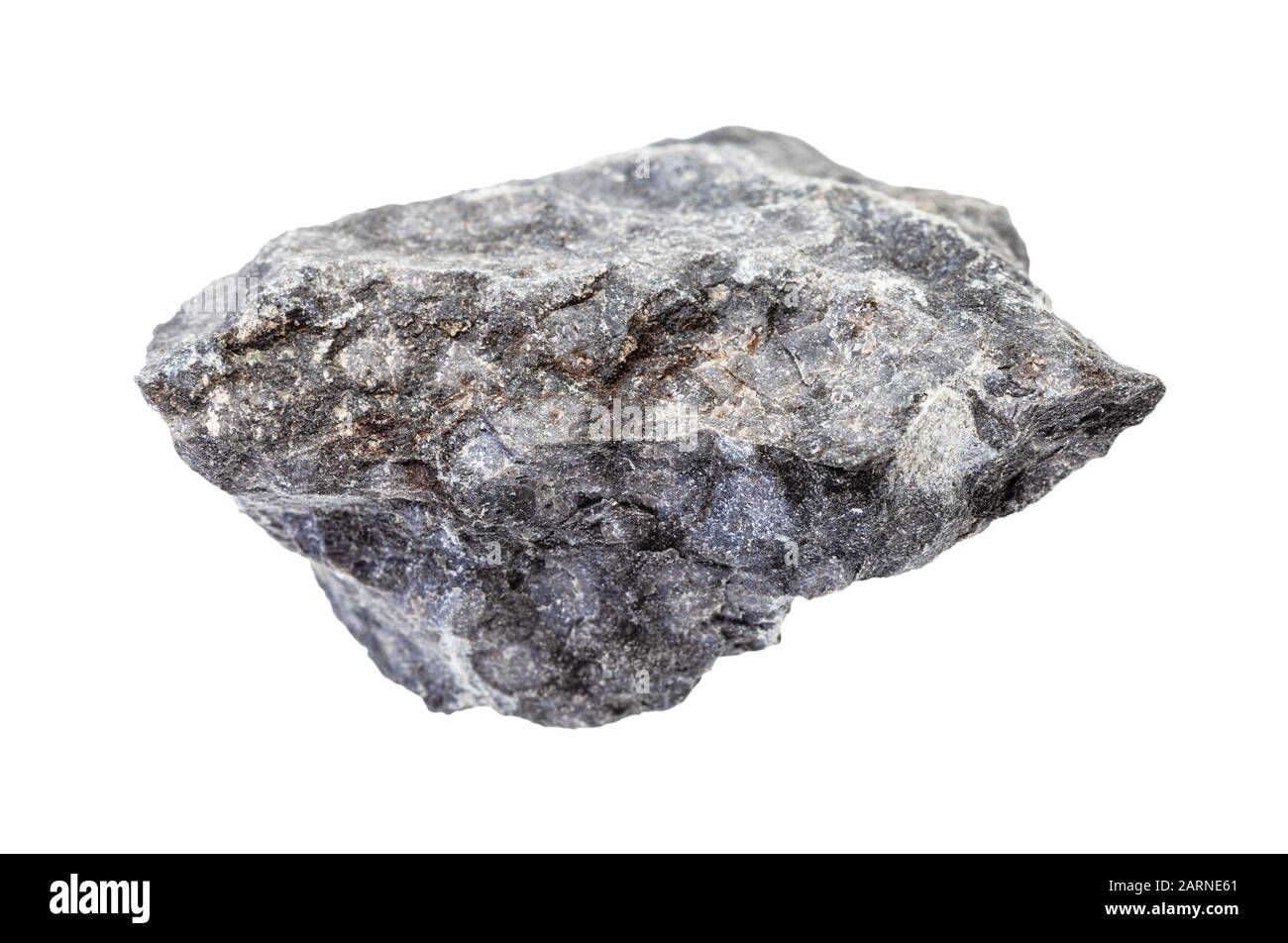 closeup of sample of natural mineral from geological collection - raw gray Basalt rock isolated on white background Stock Photo