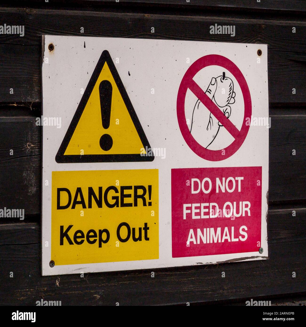 Danger keep out. Do not feed our animals. Sign at zoo Stock Photo