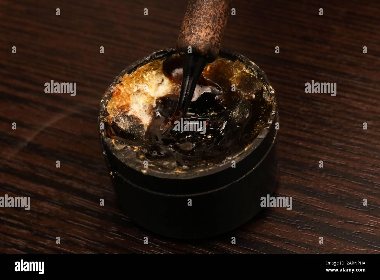 Soldering iron tip and solder flux close up Stock Photo Alamy