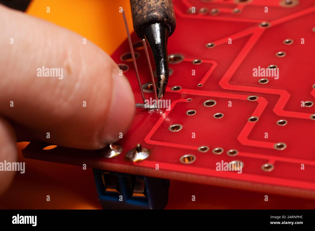 Soldering process on a printed circuit board Stock Photo Alamy