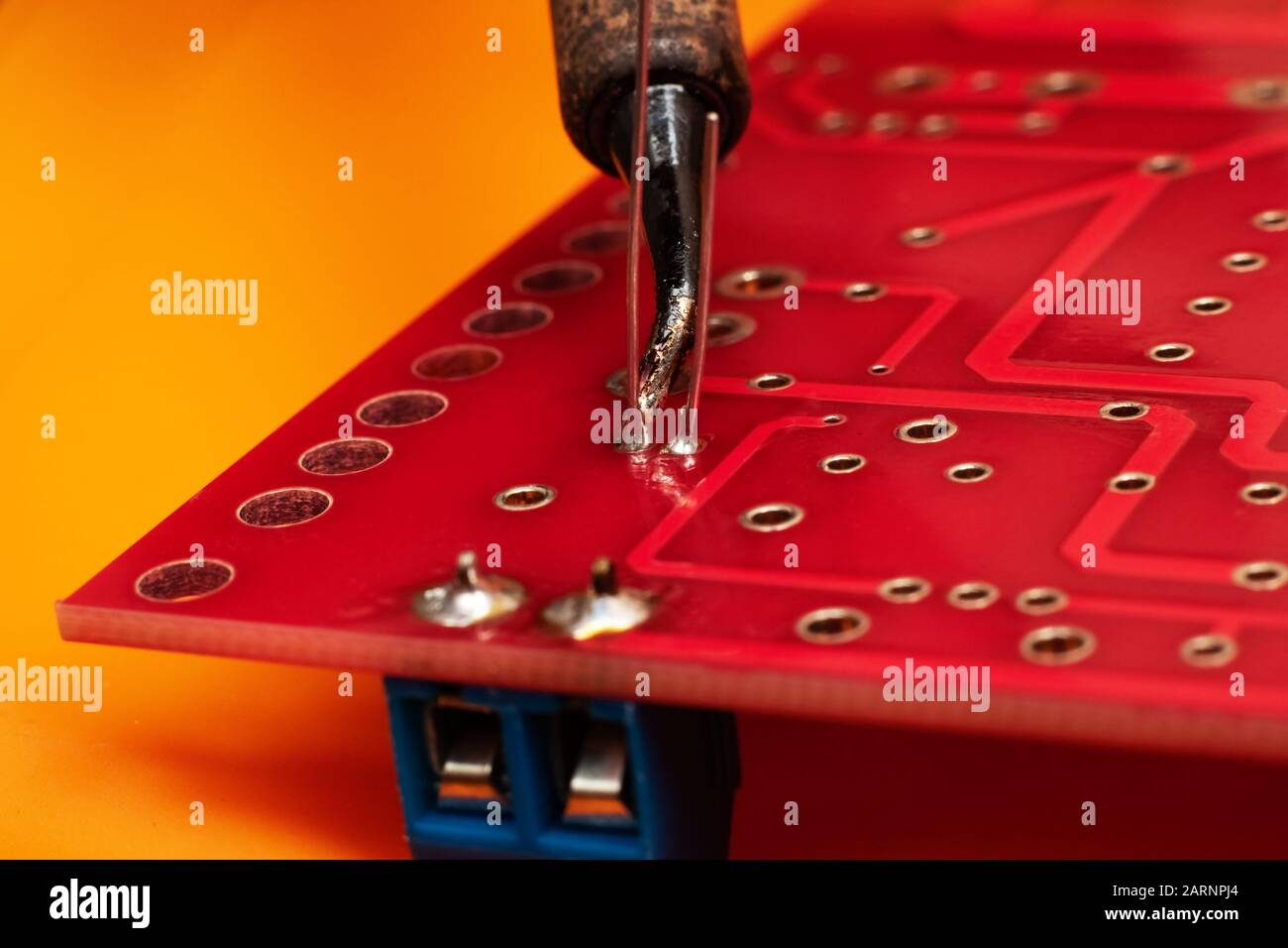 Soldering process on a printed circuit board Stock Photo Alamy