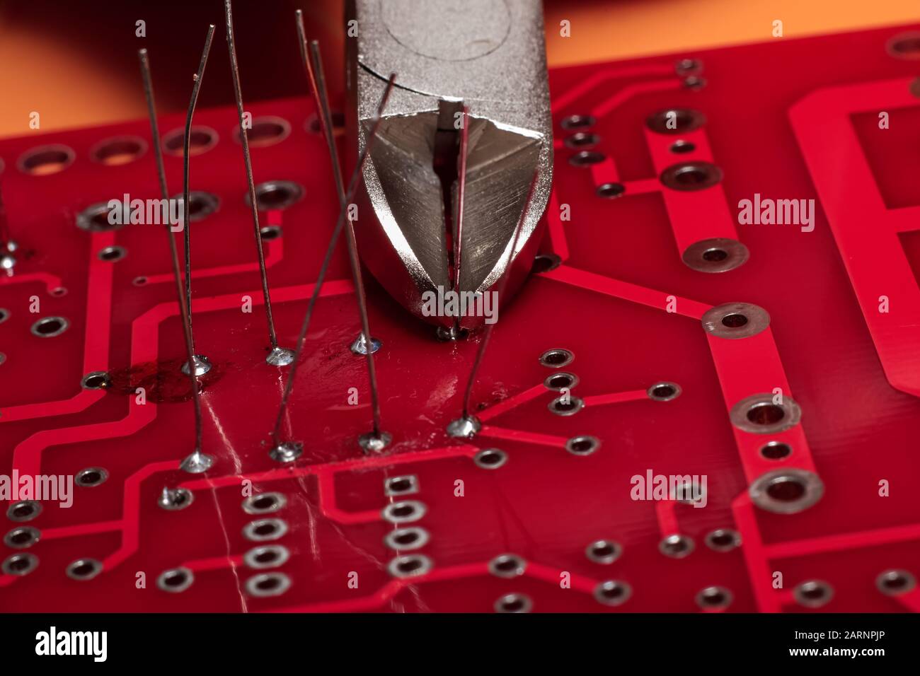 Printed circuit board with wires and wire cutters Stock Photo Alamy