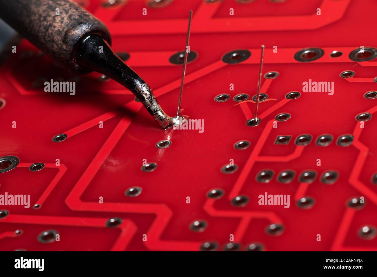 Soldering process on a printed circuit board Stock Photo Alamy