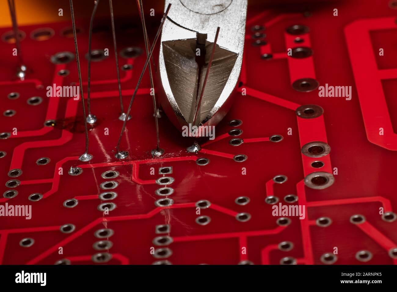 Printed circuit board with wires and wire cutters Stock Photo Alamy