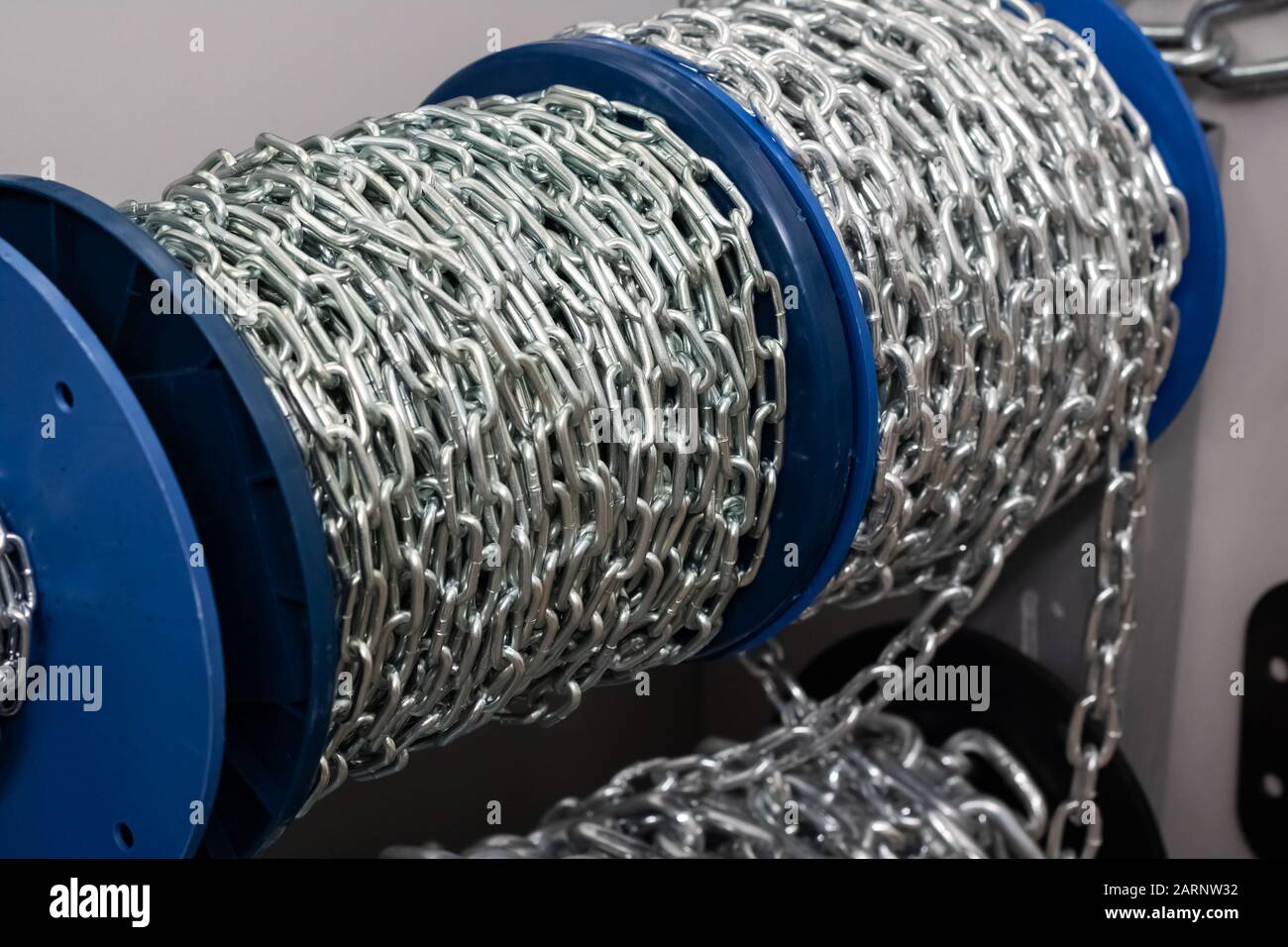 Large chain wound into a coil close up Stock Photo Alamy
