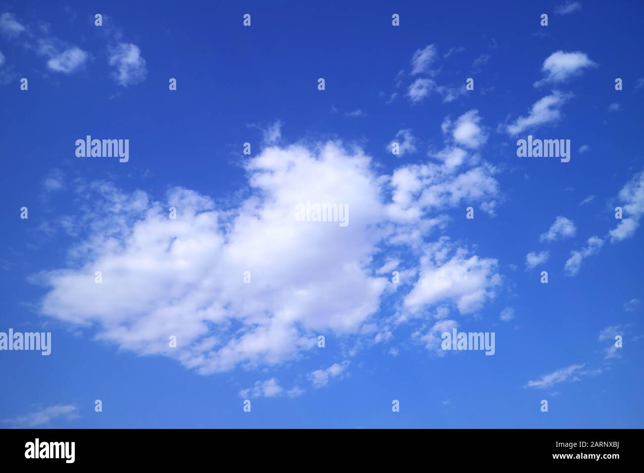 Pure White Clouds Floating on the Vibrant Blue Sky Stock Photo - Alamy