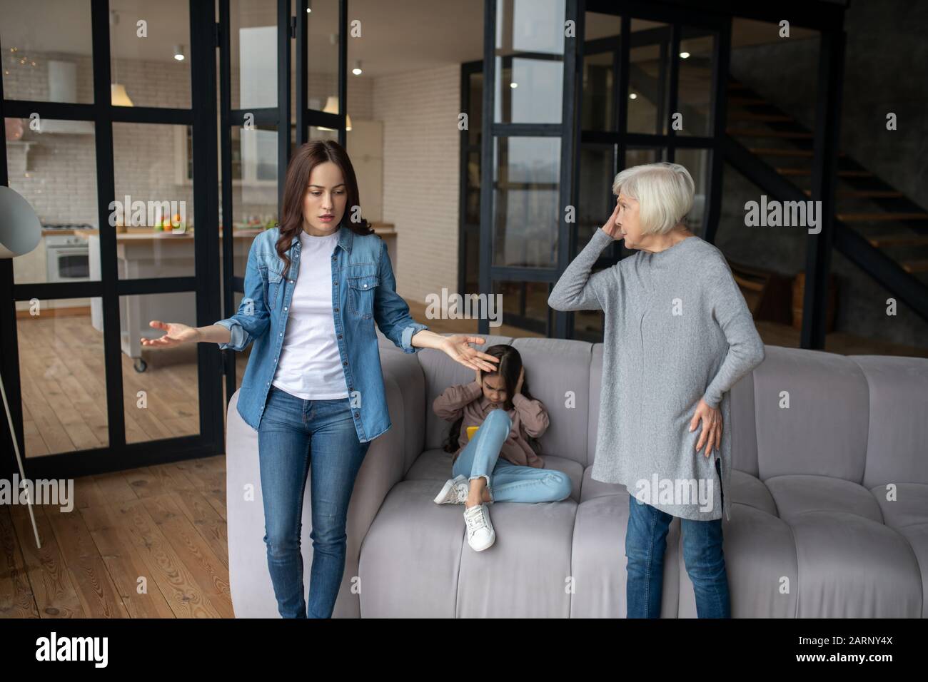 Adult mom and daughter find out the relationship by talking. Stock Photo