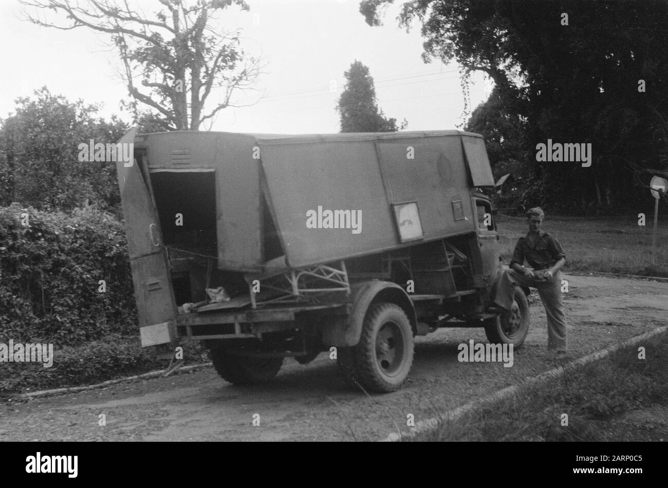 From Singkarak to Padang Pandjang  [a destroyed truck or mobile canteen in Fort de Kock] Date: January 1949 Location: Indonesia, Dutch East Indies, Sumatra Stock Photo