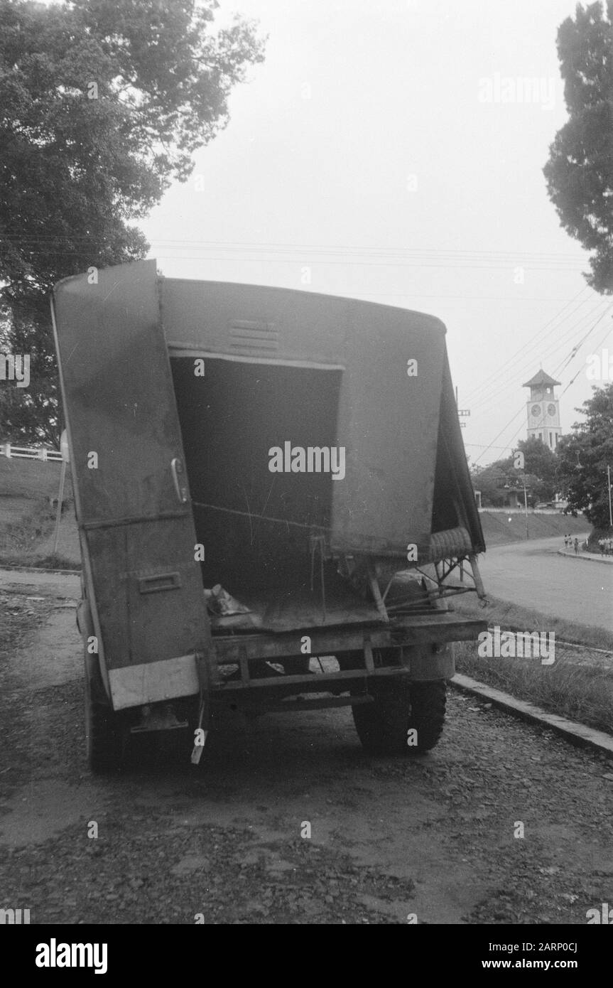 From Singkarak to Padang Pandjang  [a destroyed truck or mobile canteen in Fort de Kock] Date: January 1949 Location: Indonesia, Dutch East Indies, Sumatra Stock Photo
