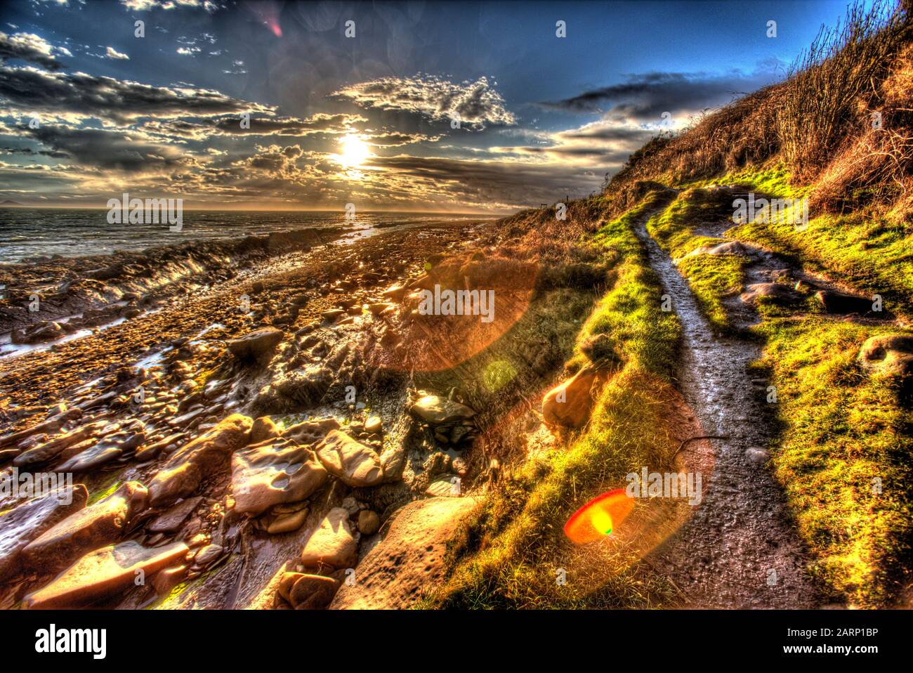 Fife Coastal Path, Scotland. Artistic silhouetted view of the Fife Coastal Footpath between the Fife villages of Pittenweem and St Monans. Stock Photo