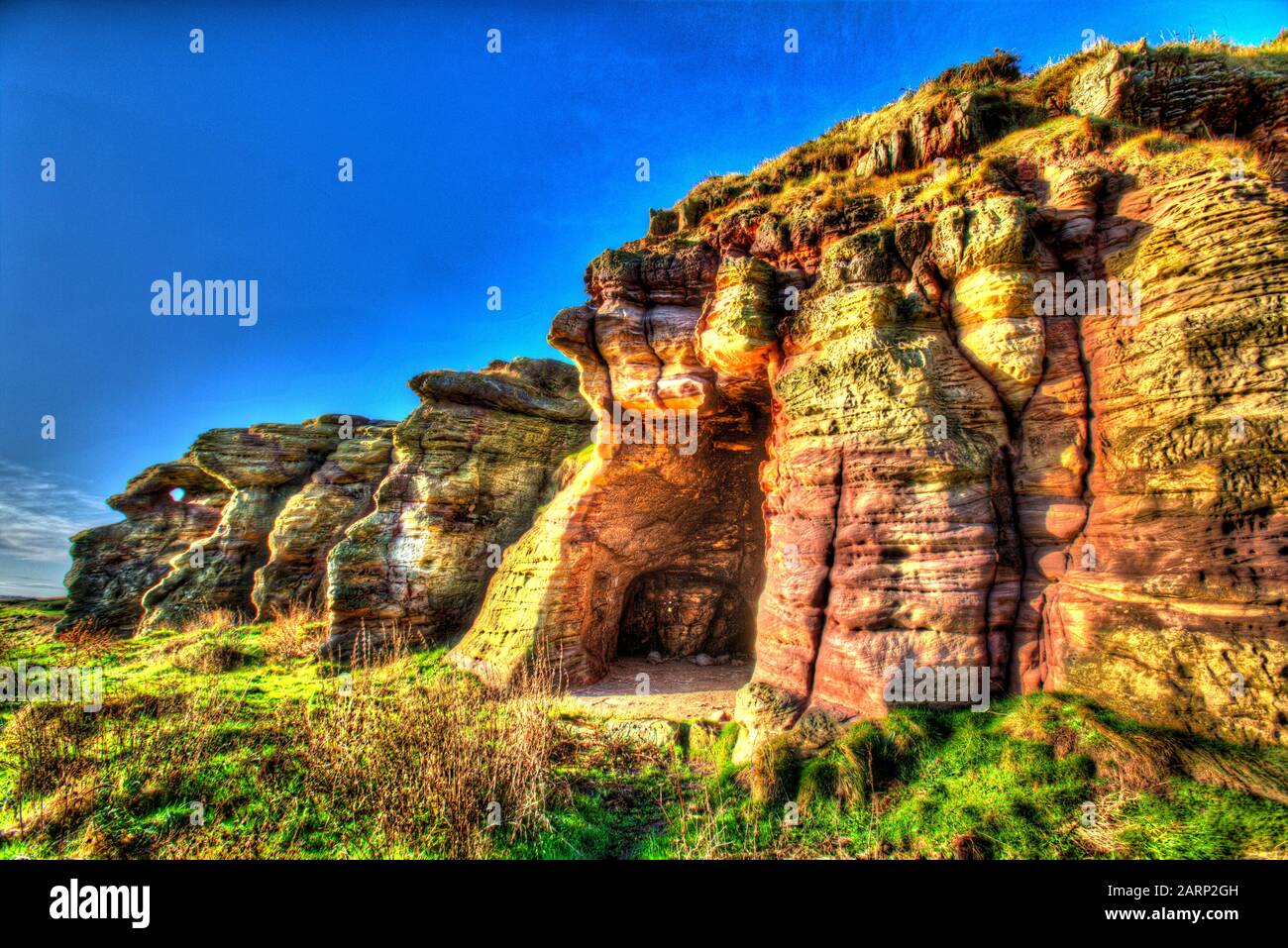 Fife Coastal Path, Scotland. Artistic view of the Caiplie Caves on the Fife Coastal Path between the villages of Anstruther and Crail. Stock Photo