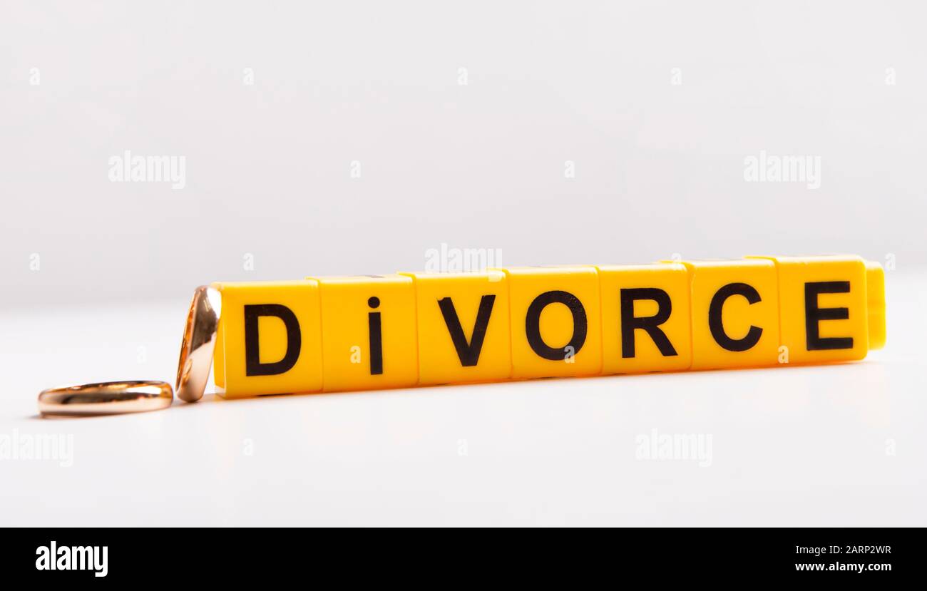 Word Divorce made of plastic letters on the table Stock Photo