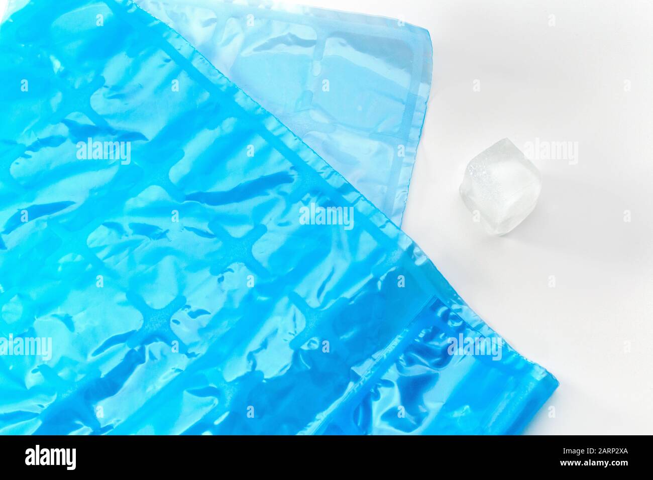 blue plastic Ice Cube Bags Disposable, Ice Cube Mold Trays Self-Seal Faster  Freezing Maker on white background Stock Photo - Alamy