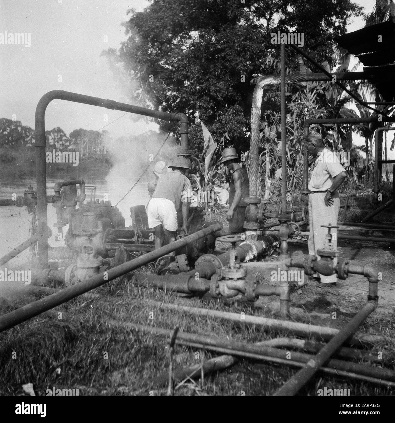 [An installation near a river] Date: 1947/01/01 Location: Indonesia, Dutch East Indies Stock Photo