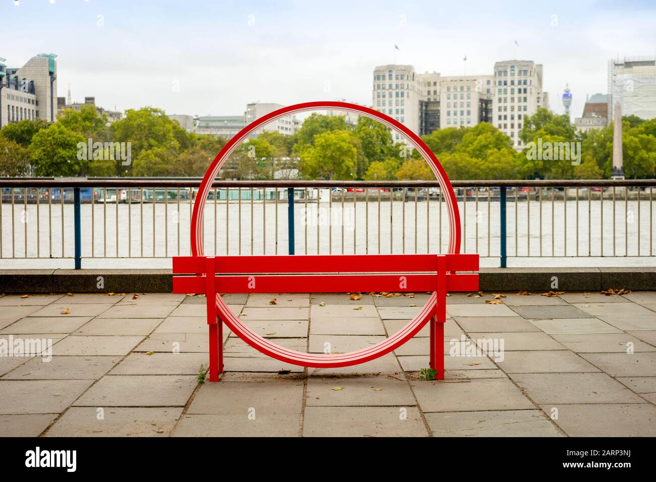 Circle bench on Thames river bank, London, UK Stock Photo