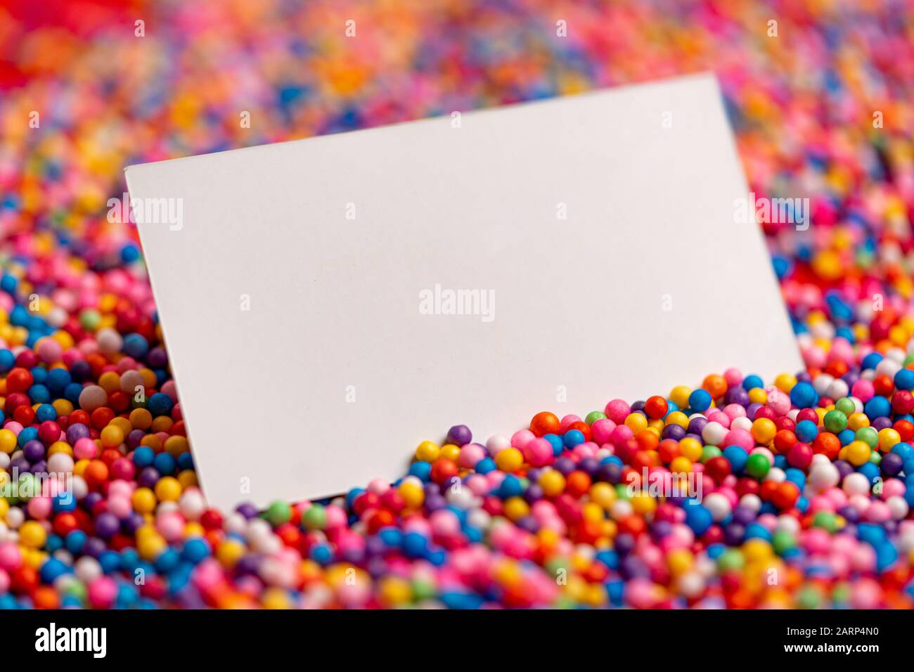White Blank Business Card On Colorful Sprinkles For Cake Topping Stationery Copy And Empty Space Sugar Sprinkle Dot Decoration For Cake And Bakery Stock Photo Alamy