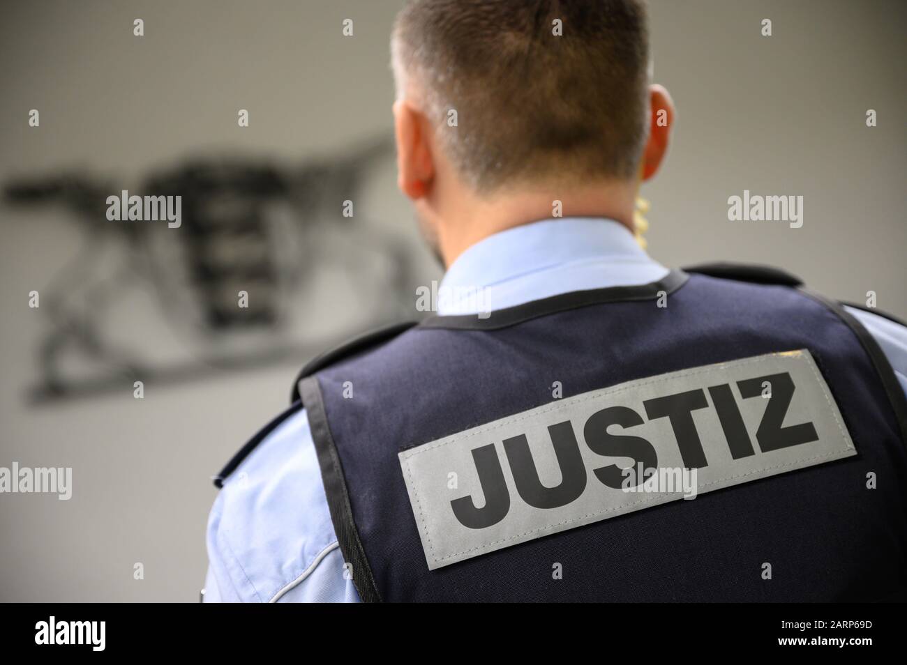 Stuttgart, Germany. 28th Jan, 2020. A judicial officer stands in a
