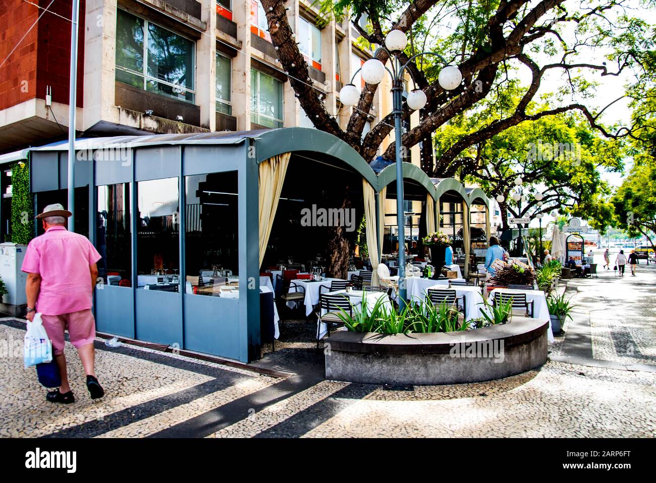 The main restaurant and cafe area in Funchal on the island of Madeira are filledwith restaurants serving food from many different nationalities Stock Photo