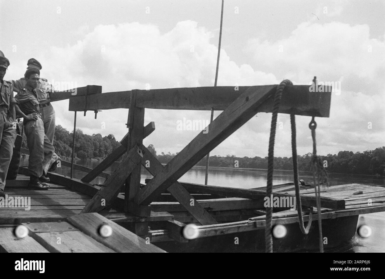 Ferry over river Date: 1947/01/01 Location: Indonesia, Dutch East Indies Stock Photo