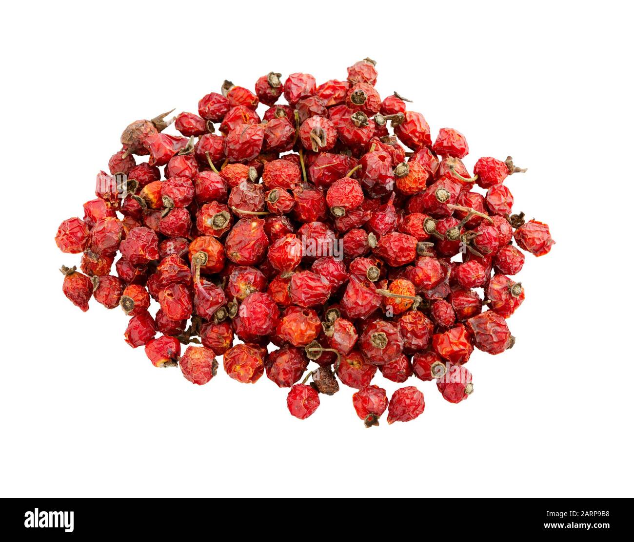 Dry berry Rose hips isolated on a white background. Natural herbal medicine, medicinal herbs. Pile of dogrose. Red dry fruits. Healthy food. Stock Photo