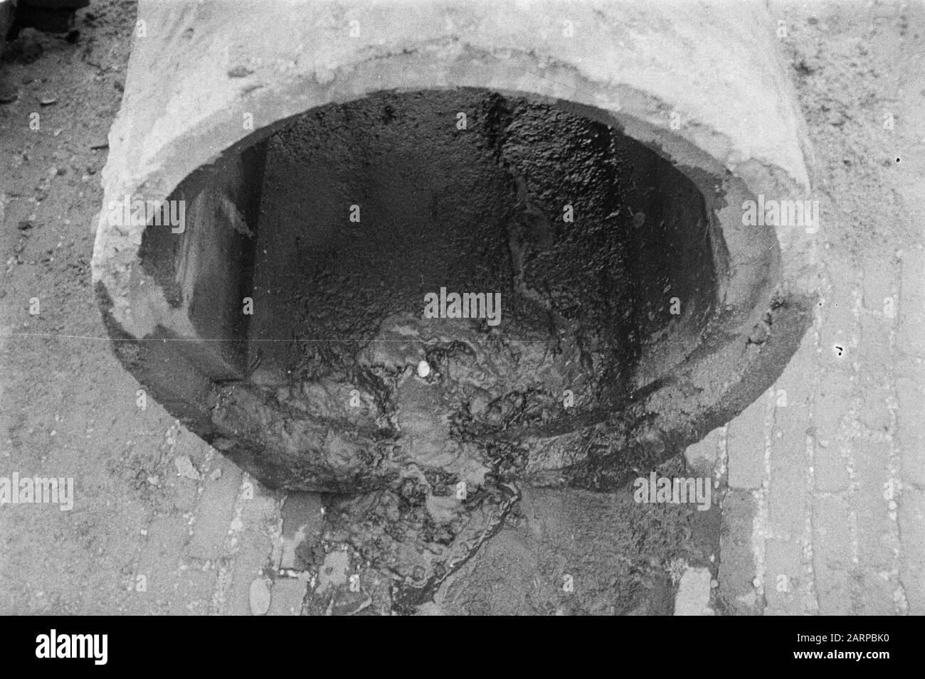 error constructed sewerage Date: August 1951 Location: Berghem Keywords: gardening, divers, graves and demon of ditches, laying sewerage, normalization of streams , sewer pipes Stock Photo