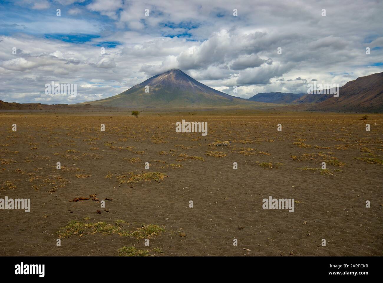 The volcano Oldoinyo Lengai as seen from the Engaresero airstrip, Northern Tanzania Stock Photo