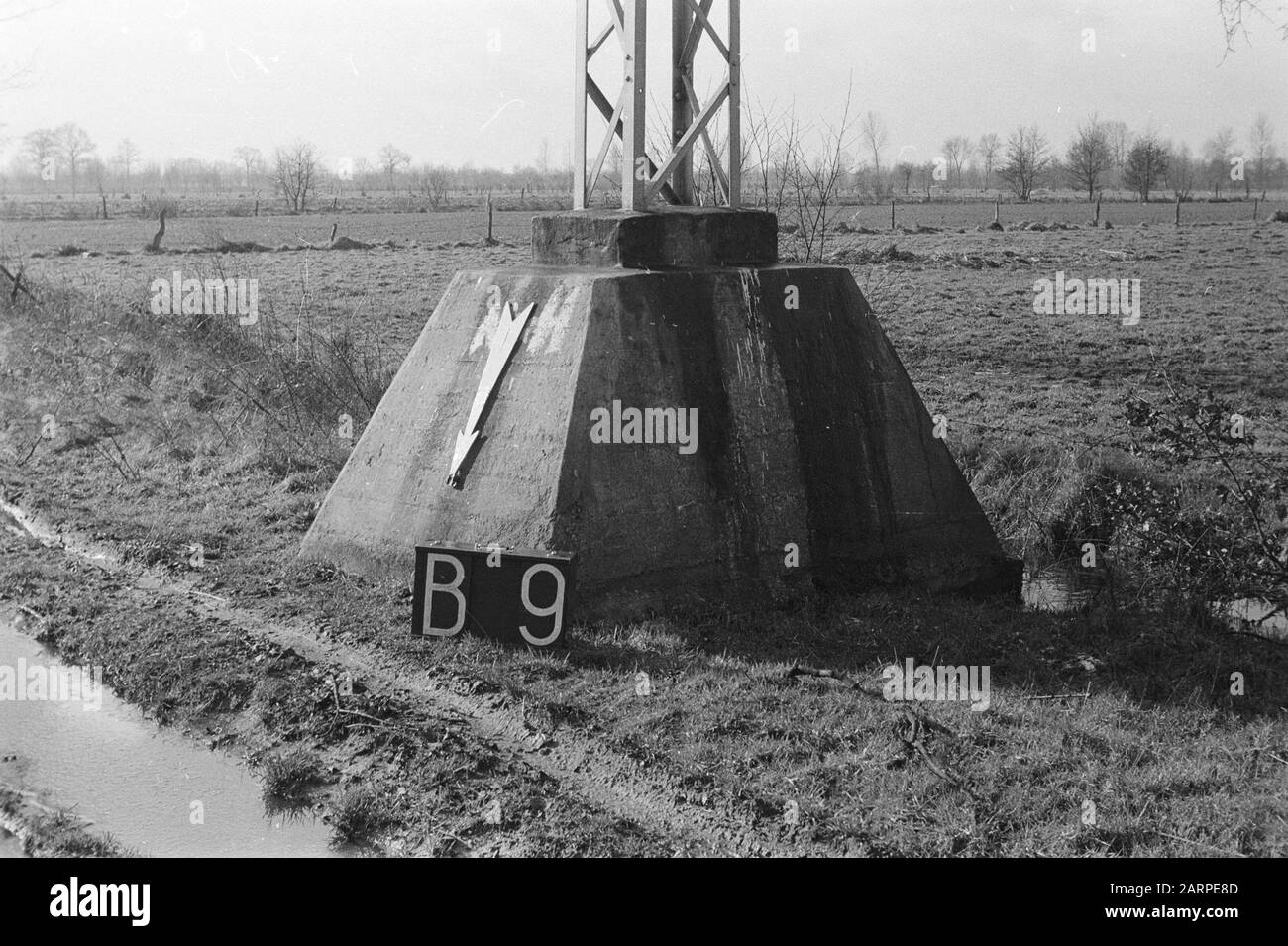 Fixed Points Culturetechnical Service  Pinth of high voltage mast near Boekel (subdivision Boekel) Annotation: B-9. Noord-Brabant Keywords: Land consolidation, terrain watermodifications Stock Photo