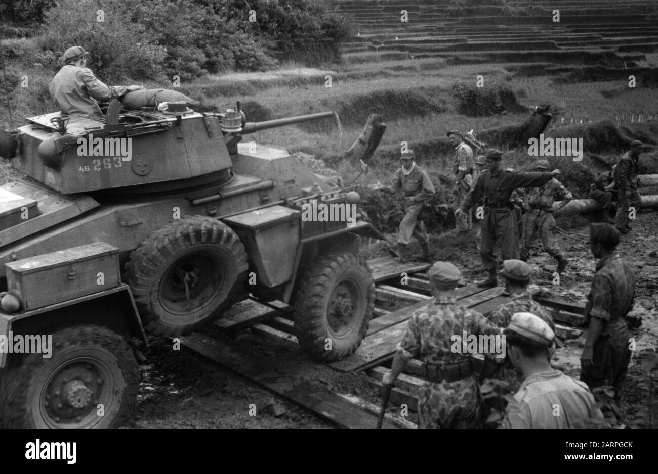 Proceeding to Fort van der Capellen and Fort de Kock (Anei gorge)  [Humber armored car passes an improvised wooden bridge] Date: December 29, 1948 Location: Batusangkar, Indonesia, Dutch East Indies, Sumatra Stock Photo