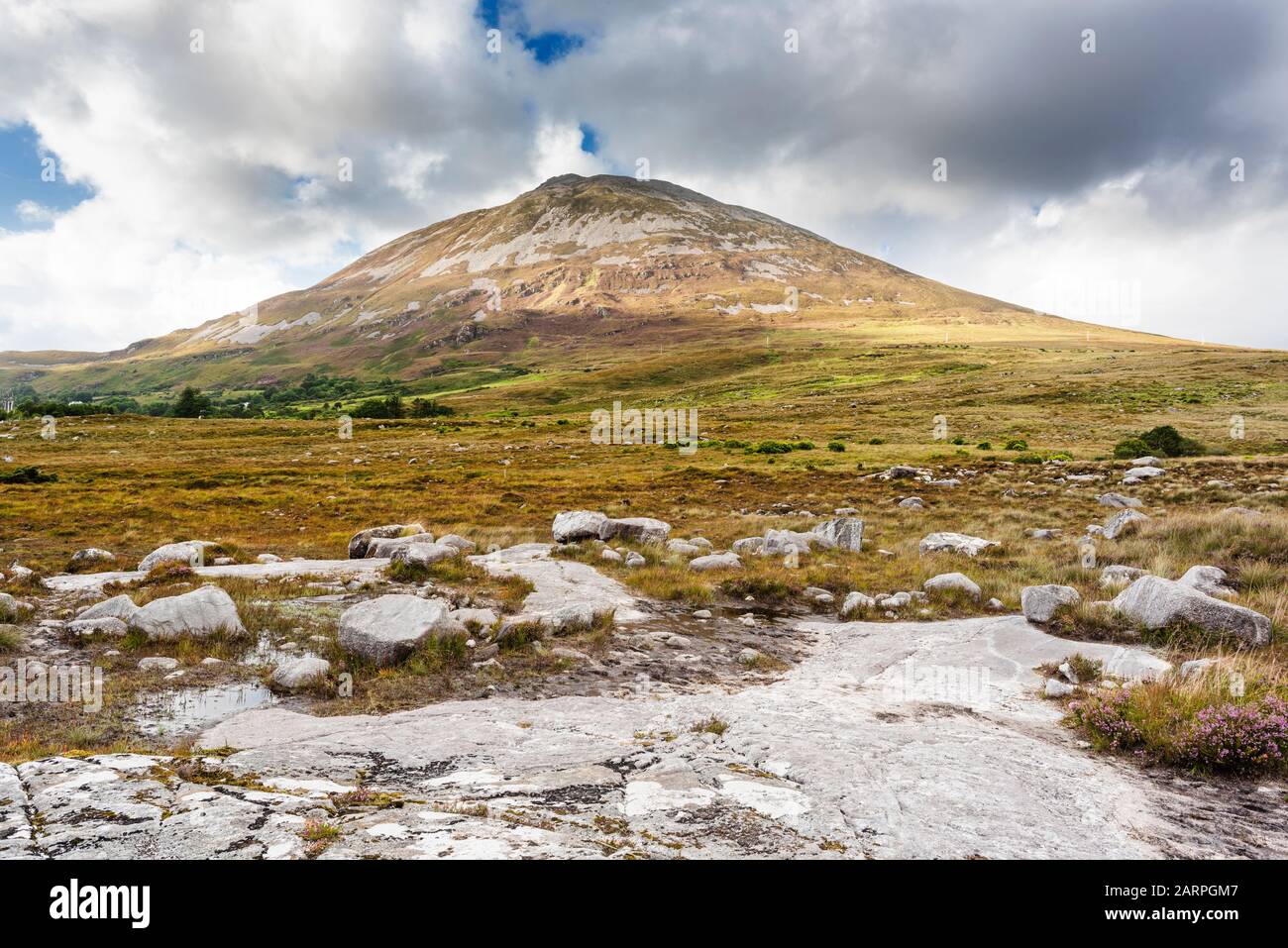 Looking towards Mount Errigal, one of Ireland's most iconic mountains, from outcrop of Main Donegal Granite near Dunlewy, County Donegal, Ireland Stock Photo