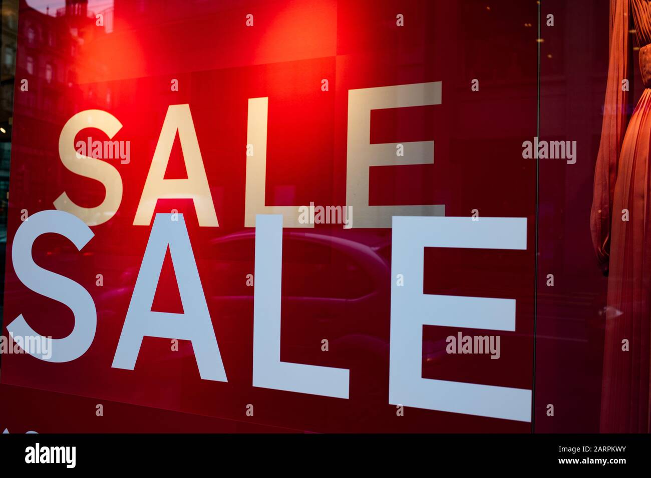 red sale sign in a shop january sales Stock Photo Alamy