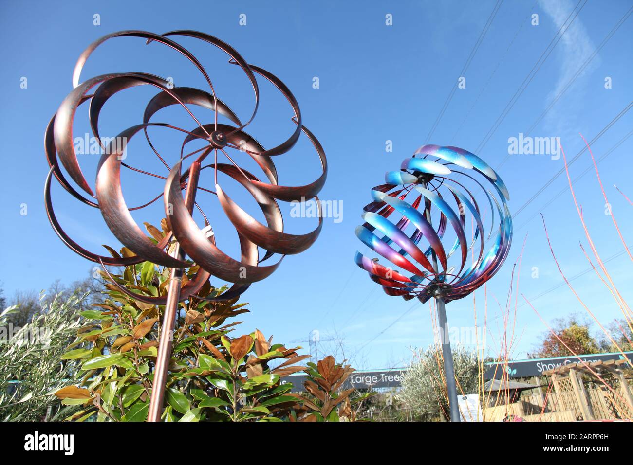Garden wind ornaments blowing at Chessington garden centre in January