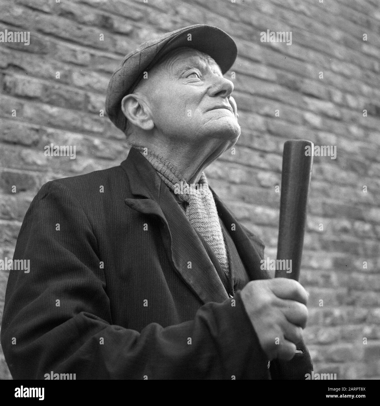 Series Here one goes out poking Date: 7 april 1948 Location: Amsterdam, Noord-Holland Keywords: men, wake Stock Photo