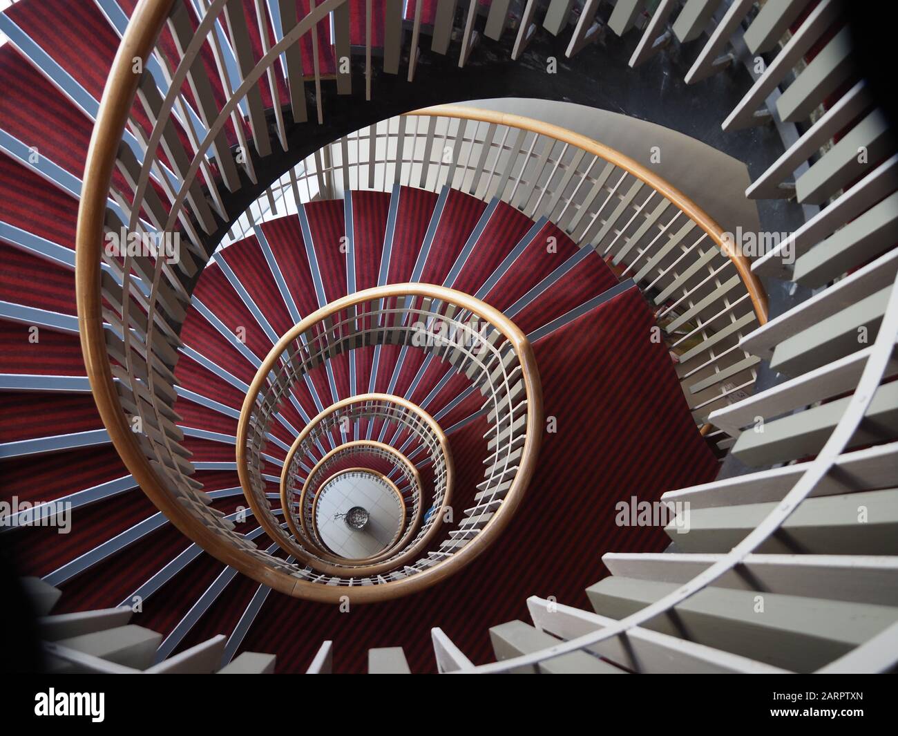 looking down a spiral staircase from above  Stock Photo