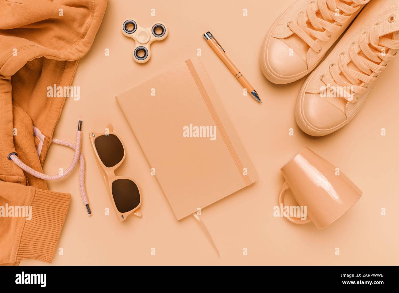 Diary textbook flat lay top view concept in pastel warm summer yellow tones Stock Photo