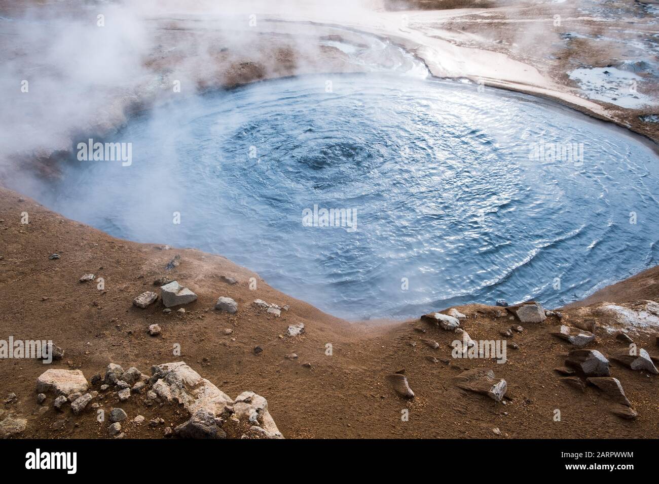 Mud pots, a form of acidic hot springs located east of Lake Myvatn in Iceland Stock Photo