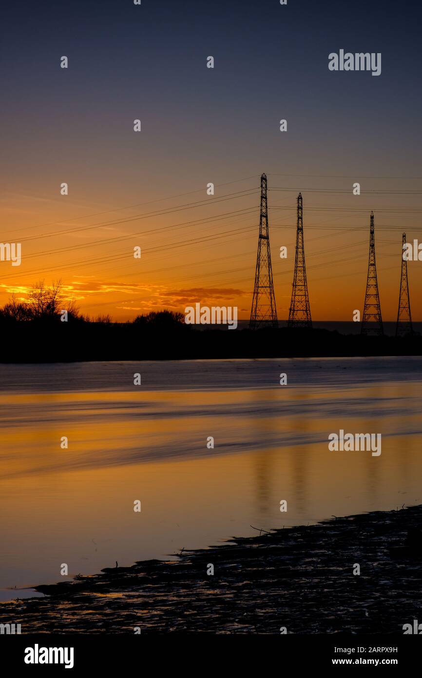 Electricity pylons in water hires stock photography and images Alamy